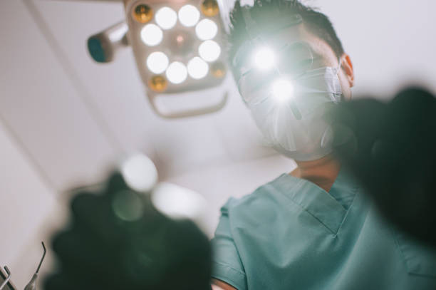 an undershot photo of a dentist while working 