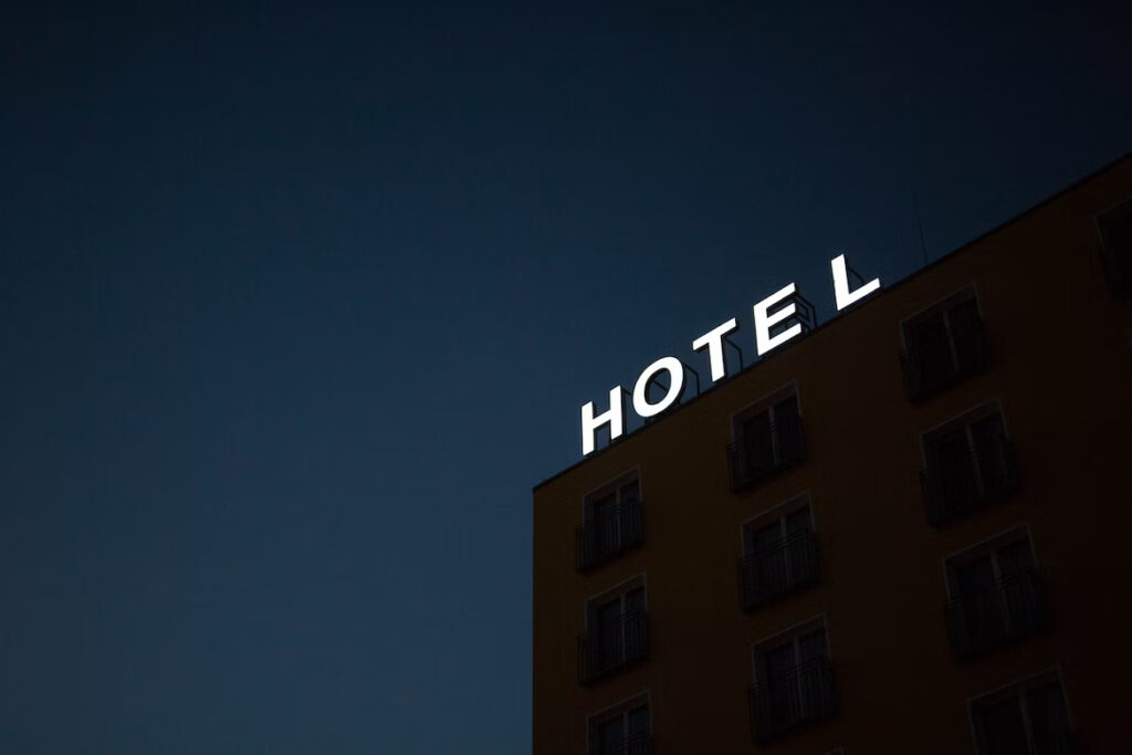 photo of a hotel with a light signage