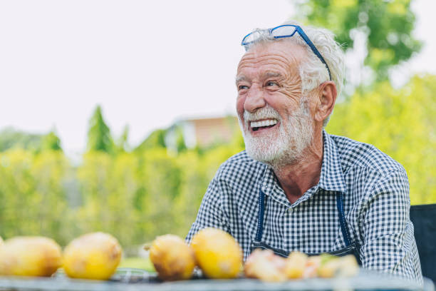 an elderly man smiling